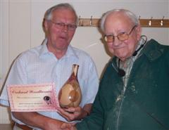 The monthly winner Mike Fisher receiving his certificate from >Bill jones